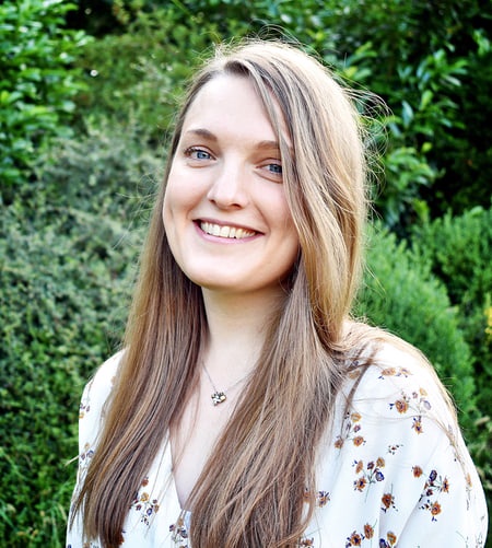 Smiling female in a garden