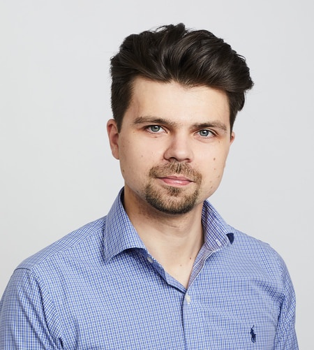 Man with beard and blue shirt